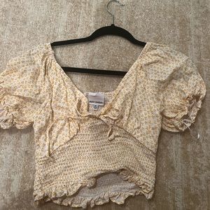 Yellow and white puffy sleeve crop top